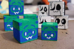 将图片加载到图库查看器，Pushable Little Guy Cubes
